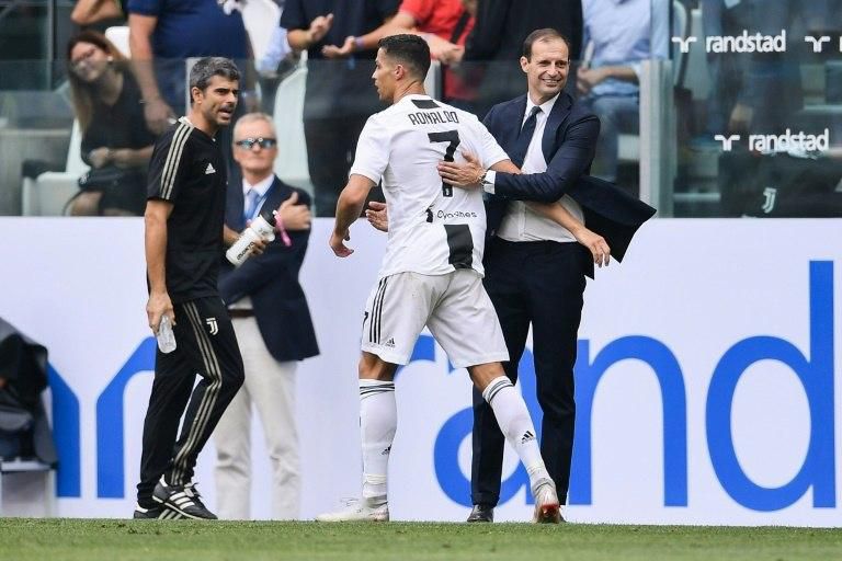 "Ronaldo's motivation is to win the Ballon d'Or next year with Juventus," said coach Massimiliano Allegri (R).