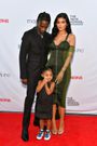 June 2021: Jenner accompanied Travis Scott and Stormi Webster to the Parsons Benefit in a green Jean Paul Gaultier dress.