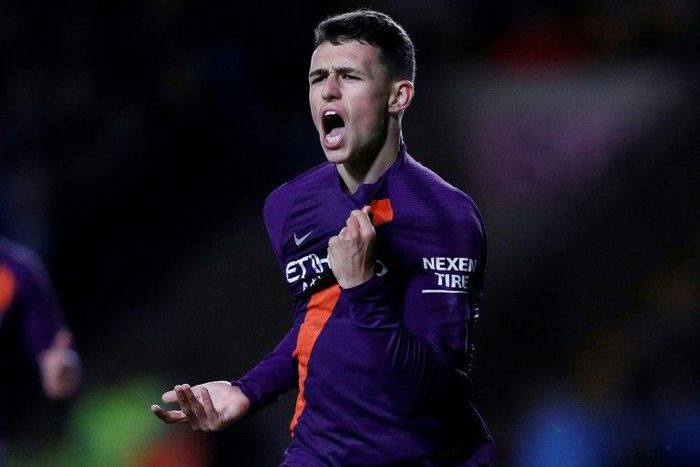 Manchester City's English midfielder Phil Foden celebrates scoring against Oxford
