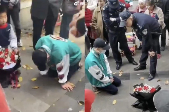 Heartbroken man kneels in front of ex-girlfriend’s office for 21 hours to beg for reunion