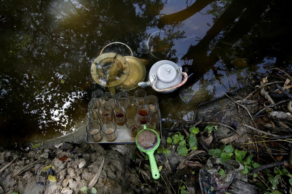 An island in India is disappearing, but some of the last residents say they can't afford to move away