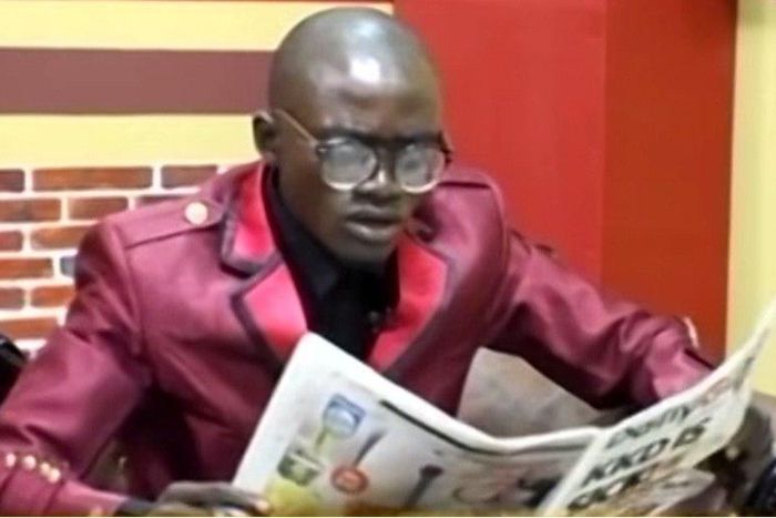 ___3619317___https:______static.pulse.com.gh___webservice___escenic___binary___3619317___2015___3___31___21___Liwin+reads+newspaper