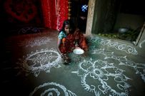 An island in India is disappearing, but some of the last residents say they can't afford to move away