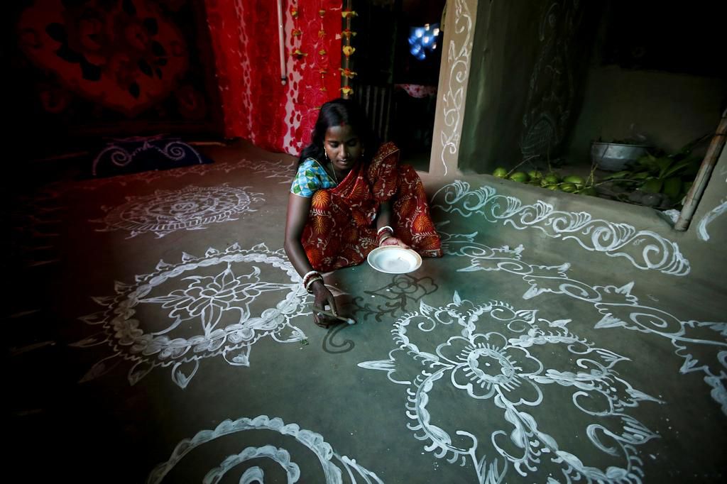 An island in India is disappearing, but some of the last residents say they can't afford to move away