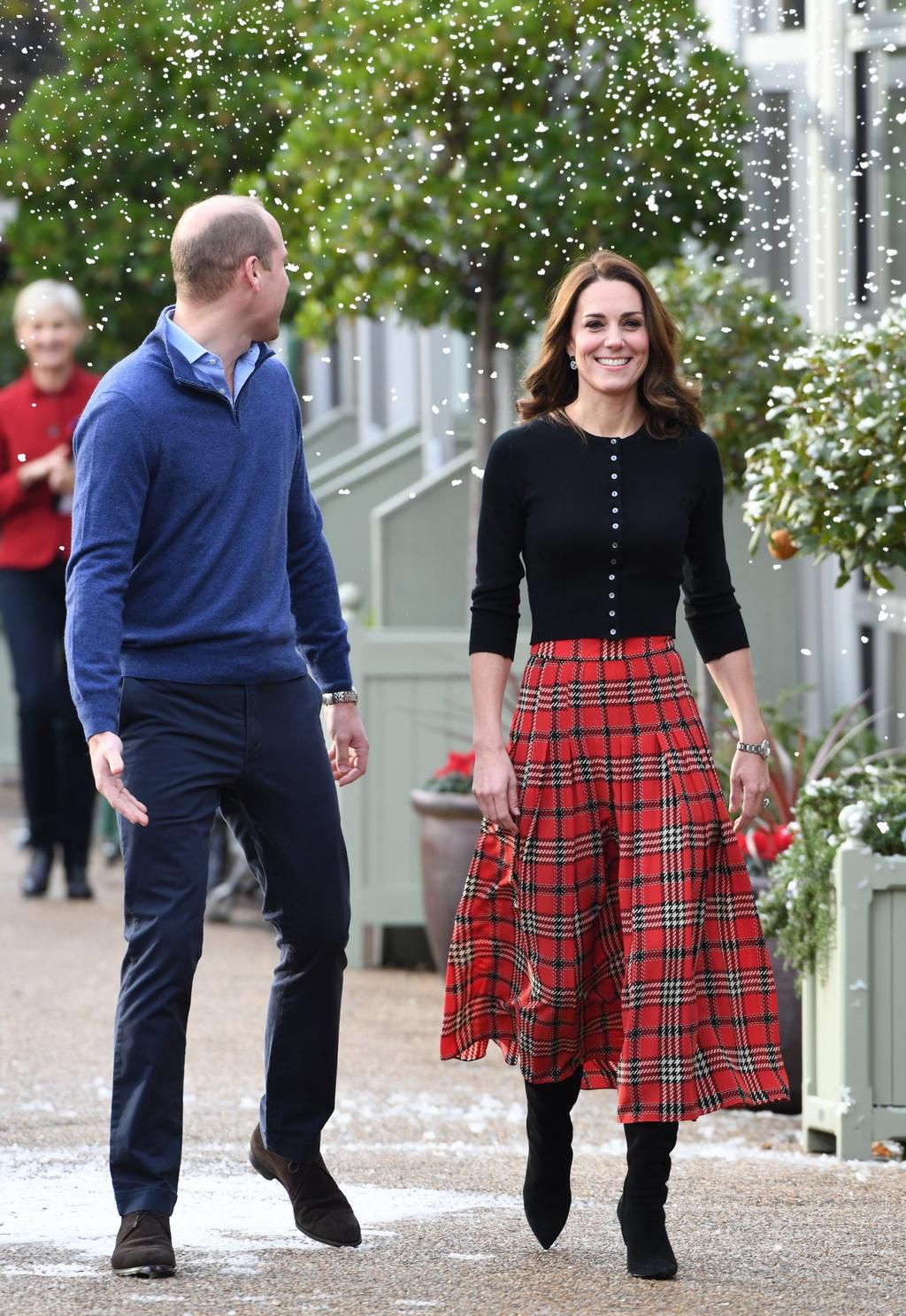 kate middleton and prince william christmas party plaid skirt