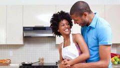 Happy couple cooking together