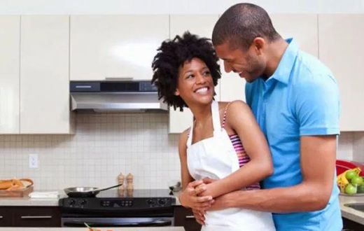 Happy couple cooking together