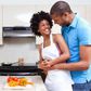 Happy couple cooking together