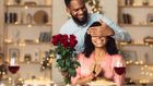 A romantic man giving her woman a flower