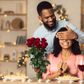 A romantic man giving her woman a flower