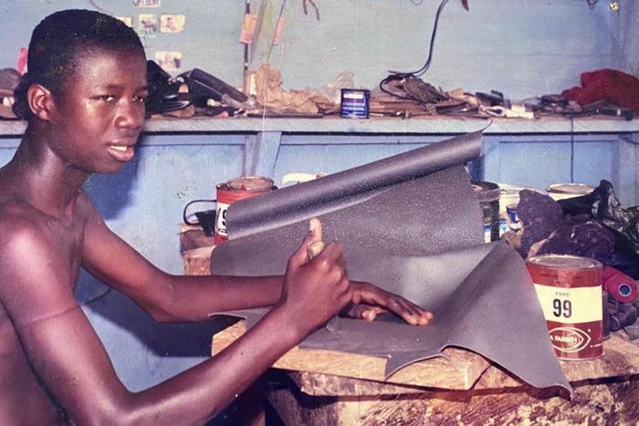 Kwaku Manu as a shoe maker