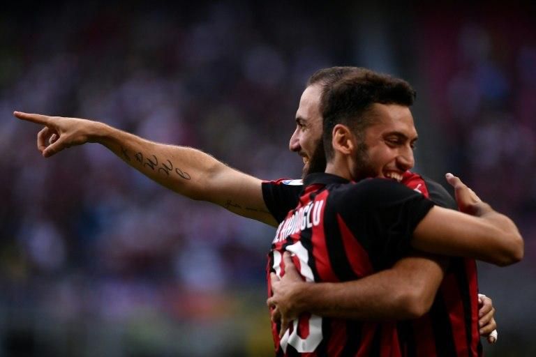 Argentinian forward Gonzalo Higuain scored his first goal at AC Milan's San Siro stadium.