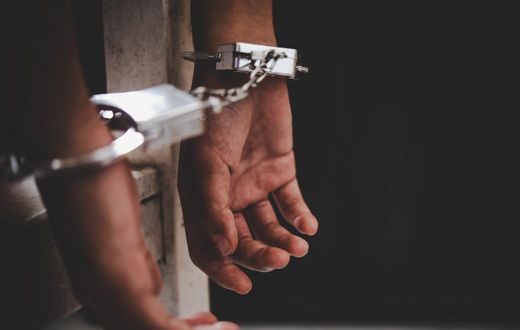 A man in handcuffs.Atit Phetmuangtong / EyeEm/Getty Images