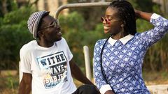 Photograph of a couple looking at each other while smiling [Image: Kwaku Griffin]