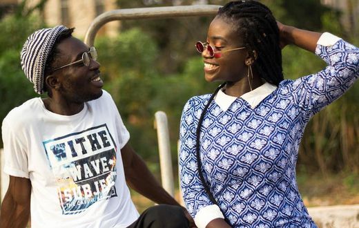 Photograph of a couple looking at each other while smiling [Image: Kwaku Griffin]