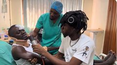 Lil Win composes a Thanksgiving song  while still in the hospital receiving treatment