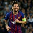 Barcelona's Lionel Messi celebrates scoring his team's fourth goal against Tottenham