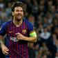 Barcelona's Lionel Messi celebrates scoring his team's fourth goal against Tottenham