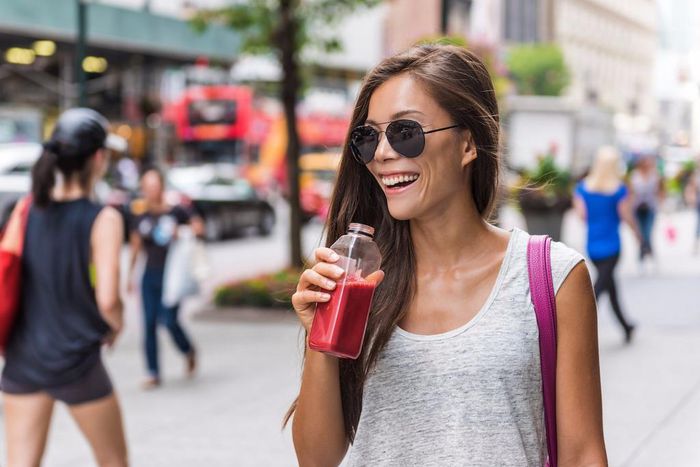 Woman Drinking Juice