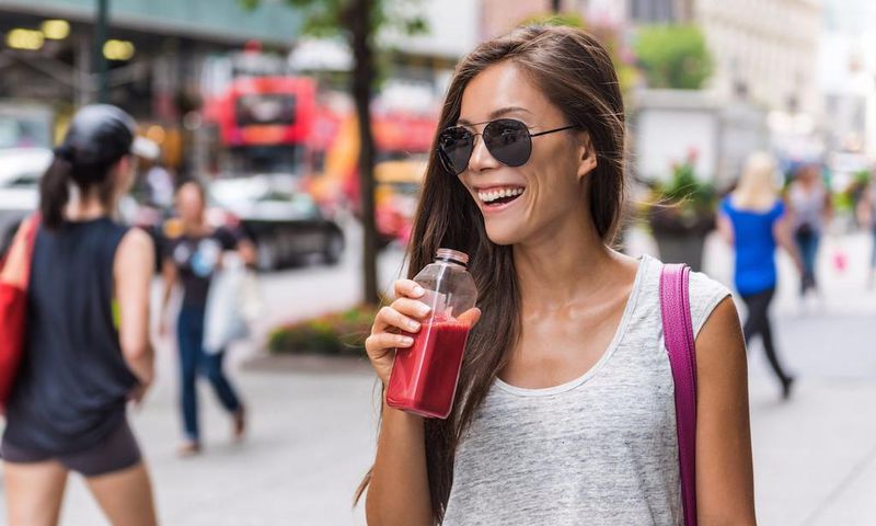 Woman Drinking Juice