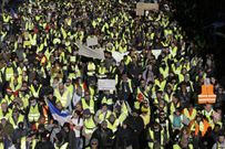 More than 1,300 were arrested and dozens injured after violent anti-government protests engulfed France — here's how the clashes unfolded