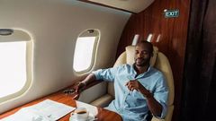 Black man inside an airplane [Deposit Photos]