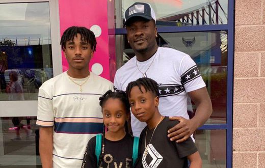 Asamoah Gyan and his three children