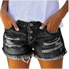 A lady  in ripped shorts