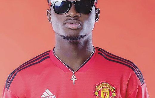 WOW! Kuami Eugene proudly rocks his Man United jersey