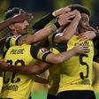 Easy does it: Dortmund defender Achraf Hakimi and his teammates celebrate