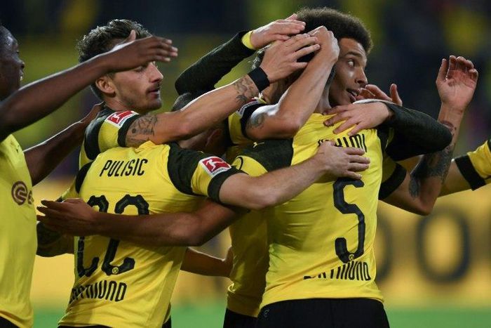 Easy does it: Dortmund defender Achraf Hakimi and his teammates celebrate