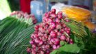 Bunches of red onion with scallions [Image Credit: Ian Panelo]