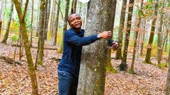 Ghanaian environmentalist sets new Guinness World Record by hugging 1,123 trees in one hour