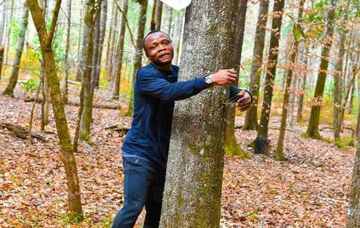 Ghanaian environmentalist sets new Guinness World Record by hugging 1,123 trees in one hour