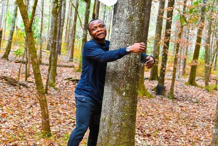 Ghanaian environmentalist sets new Guinness World Record by hugging 1,123 trees in one hour