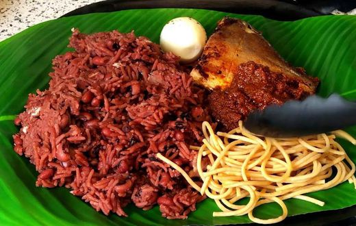 Waakye is a popular Ghanaian dish originated from northern Ghana, where rice and beans are staple food crops.