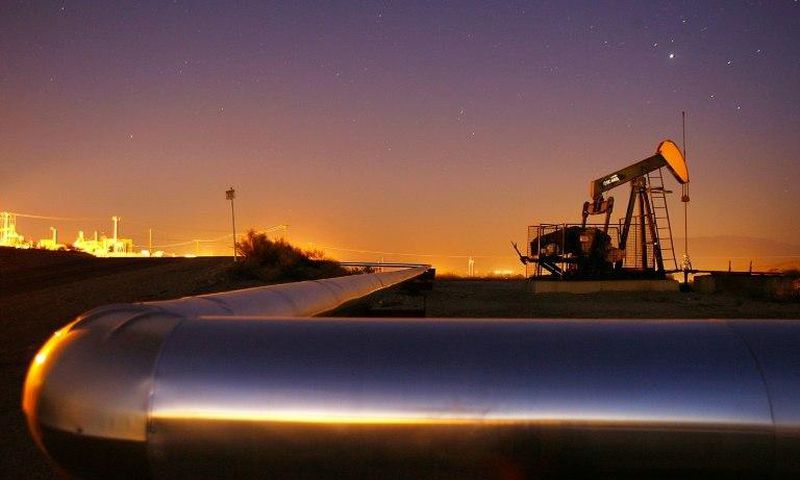 Oil prices have tumbled after the International Energy Agency cut its forecast for demand