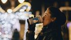 girl drinking Christmas drink