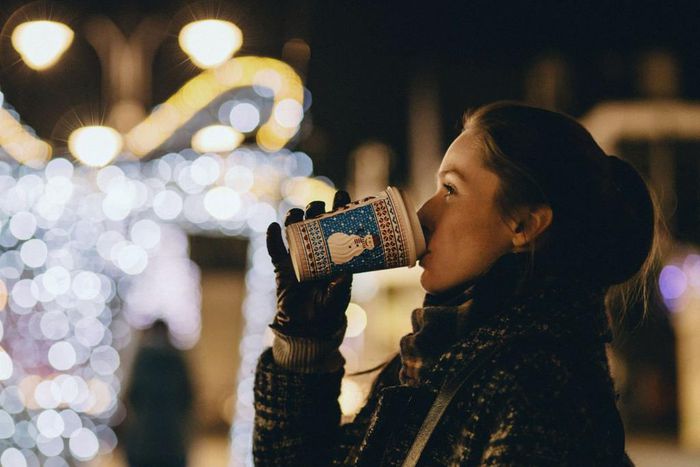 girl drinking Christmas drink