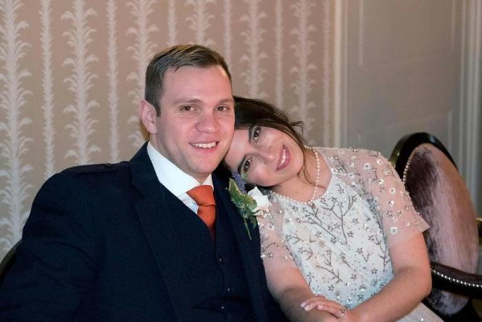 British university researcher Matthew Hedges, seen here with his wife Daniela Tejada in 2017, says his interrogators forced him to stand up for an entire day wearing ankle cuffs