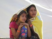 Powerful photos and stories from the caravan show migrants' harrowing journey to the US