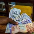 Cedi and dollar