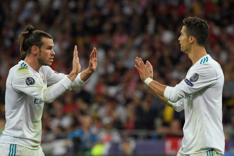 Gareth Bale (L) celebrates with Real Madrid teammate Cristiano Ronaldo during the UEFA Champions League final win over Liverpool.