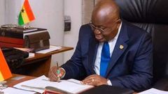 Nana Addo signs