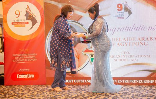 Mrs. Adelaide Siaw Agyepong, CEO of American International School, receiving her award at the 9th Feminine Ghana Achievement Awards in Accra.