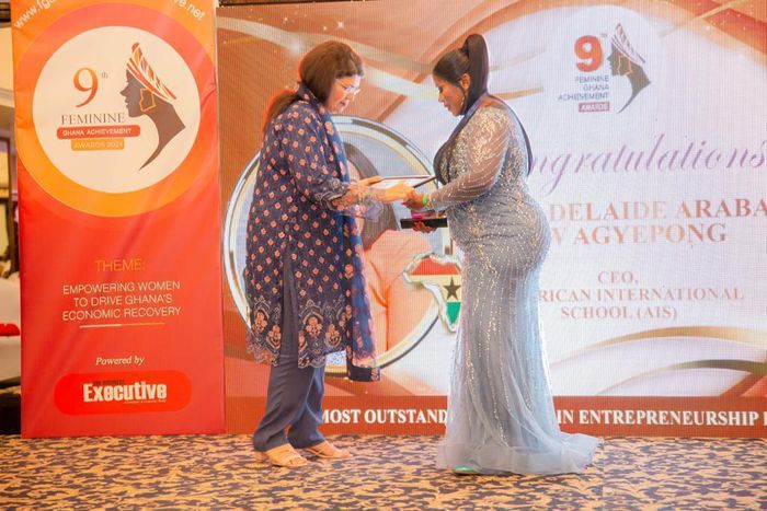 Mrs. Adelaide Siaw Agyepong, CEO of American International School, receiving her award at the 9th Feminine Ghana Achievement Awards in Accra.