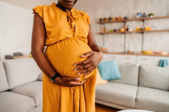 Pregnant black woman [iStock]