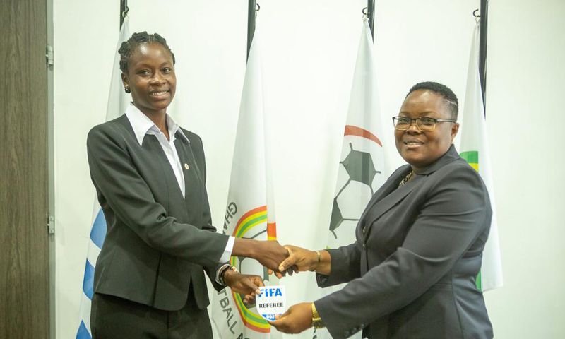 One of the 20 Ghanaian referees receive her Fifa badge