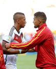Germany's Jerome Boateng (L) talk s with Ghana's Kevin-Prince Boateng before a Group G match between Germany and Ghana of 2014 FIFA World Cup at the Estadio Castelao Stadium in Fortaleza, Brazil on June 21, 2014.