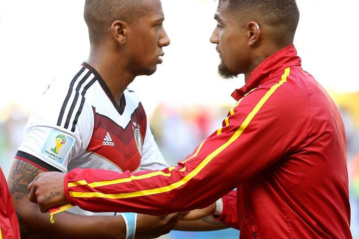 Germany's Jerome Boateng (L) talk s with Ghana's Kevin-Prince Boateng before a Group G match between Germany and Ghana of 2014 FIFA World Cup at the Estadio Castelao Stadium in Fortaleza, Brazil on June 21, 2014.